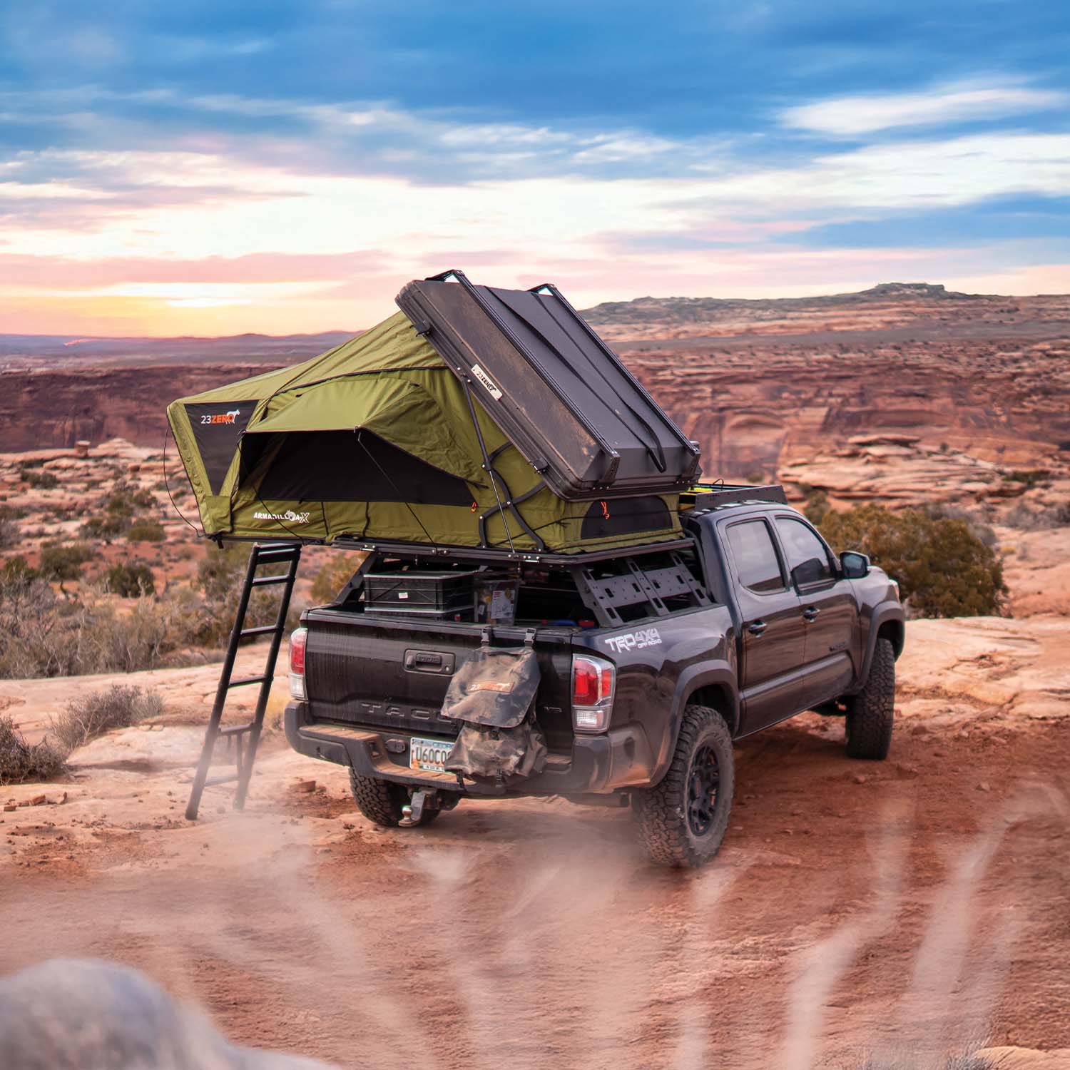 23Zero Armadillo AX2 Hard Shell Side Open Rooftop Tent on Black Toyota Tacoma In Utah Desert Landscape
