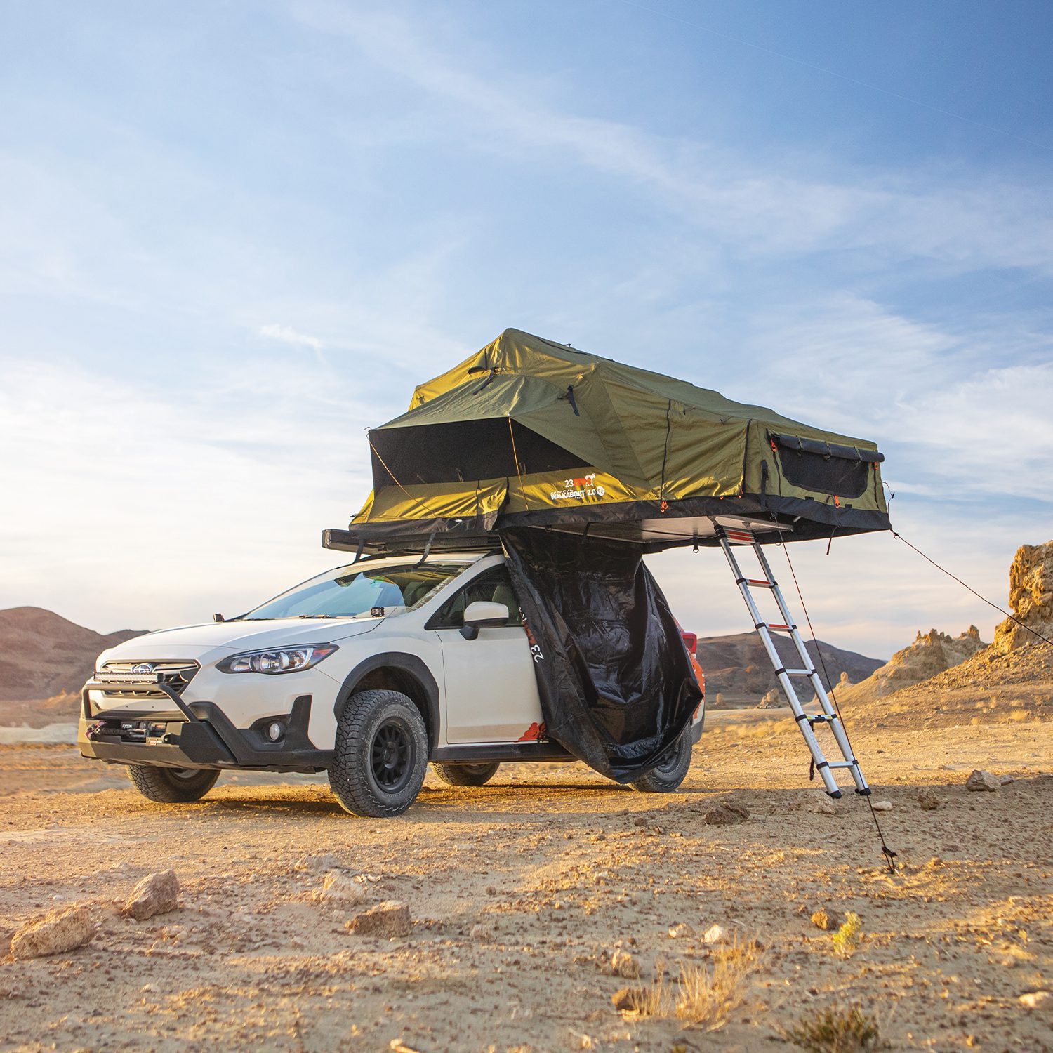 23Zero Walkabout 2.0 soft shell rooftop tent on subaru in desert, available in 56, 62, and 72 sizes